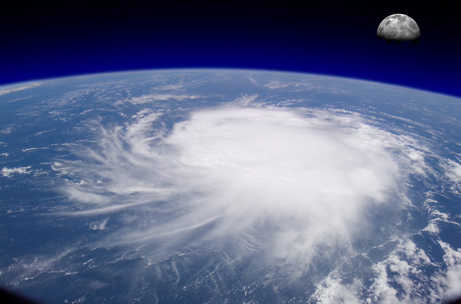 A view of the earth from space shows a large storm.