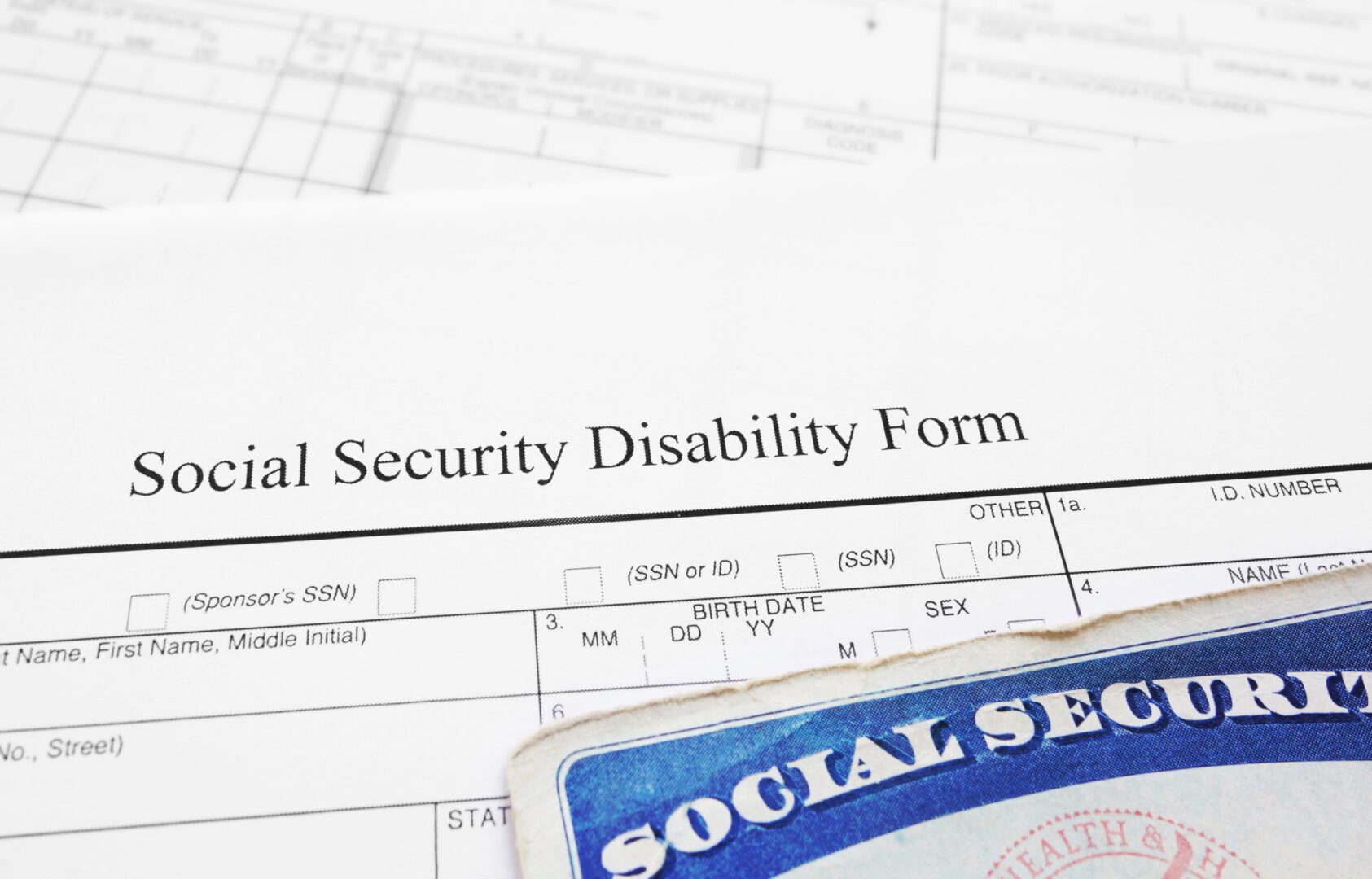 A social security disability form and an id.