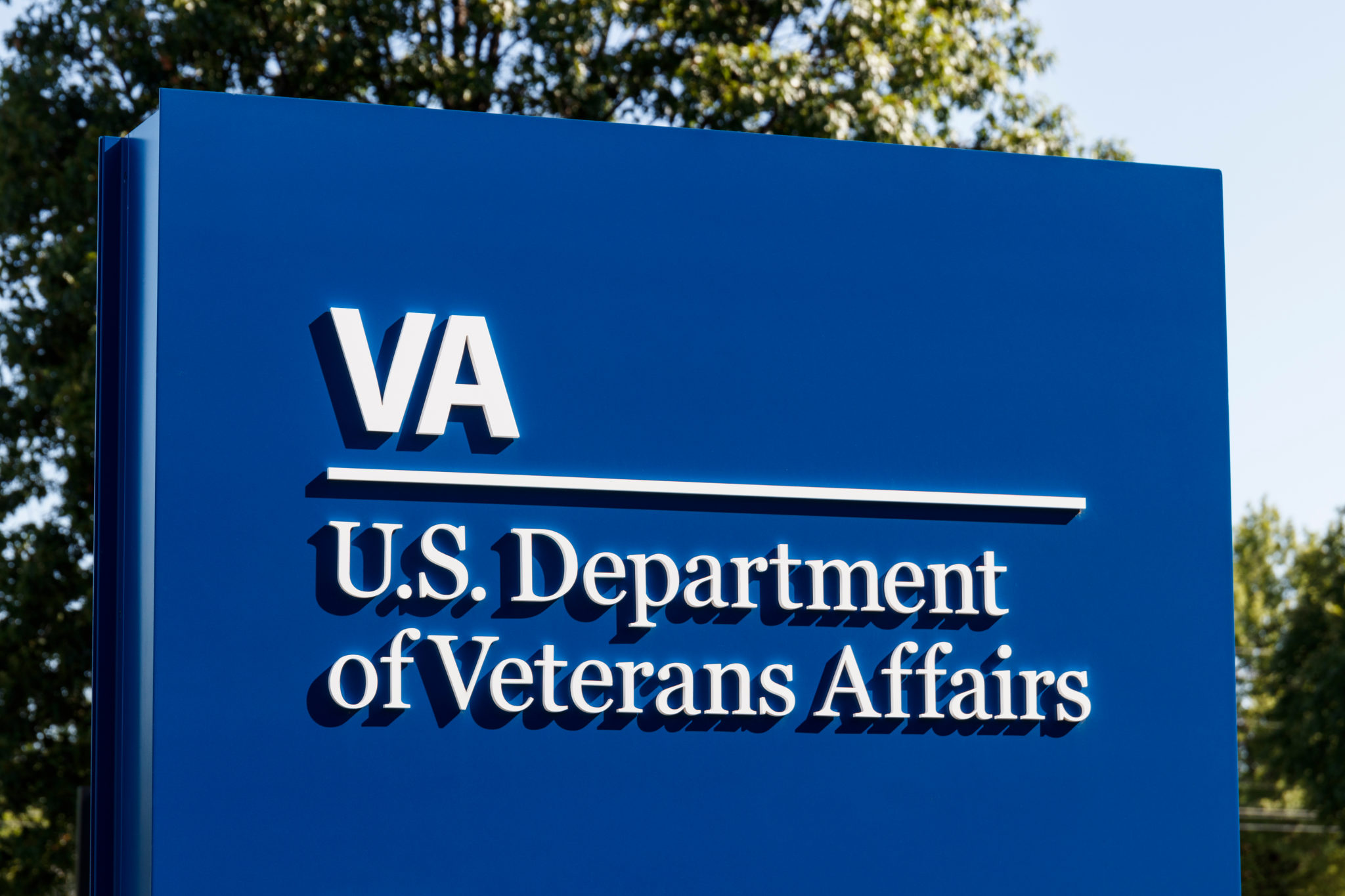 A sign that says, " va department of veterans affairs ".