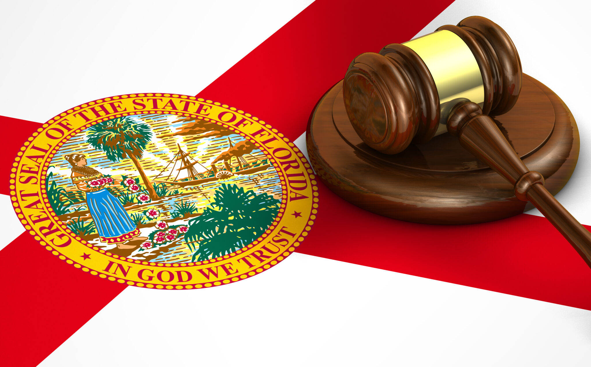 A judge 's gavel and seal of florida on top of the flag.